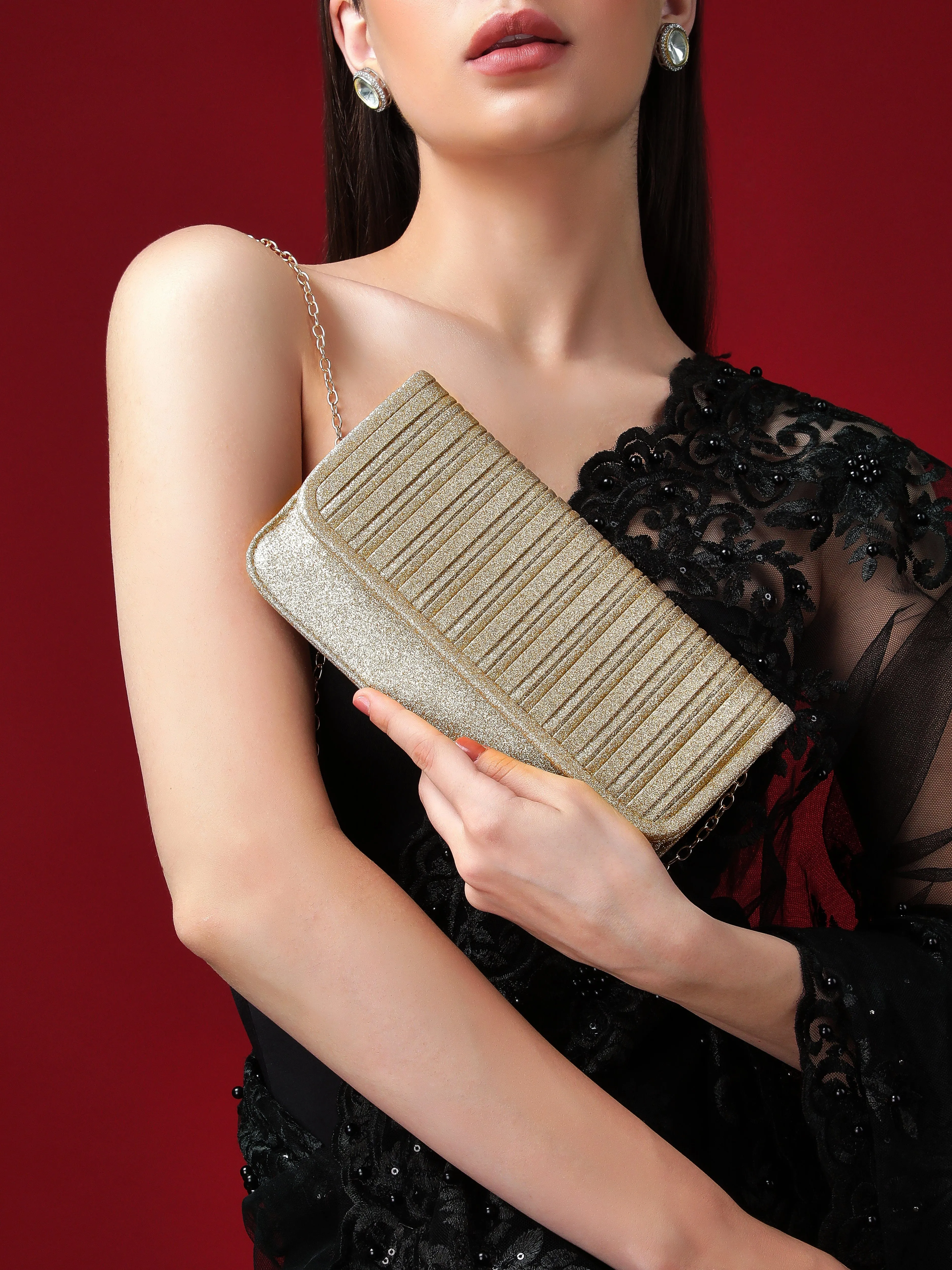 Rubans Sparkling Golden Coloured Clutch With Texture Design