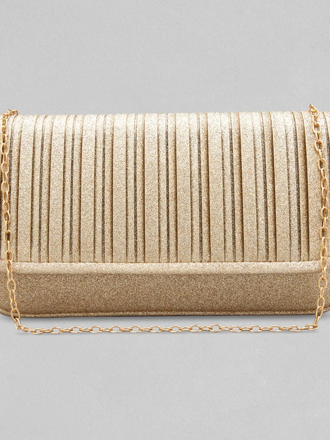 Rubans Sparkling Golden Coloured Clutch With Texture Design